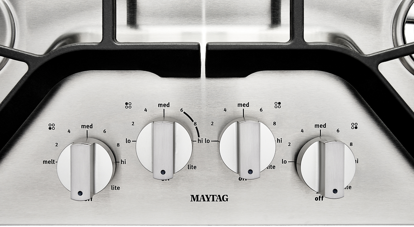 Maytag® stainless steel cooktop burner knobs