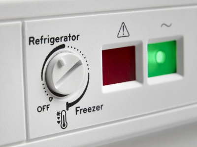 Close-up of convertible freezer thermostat controls