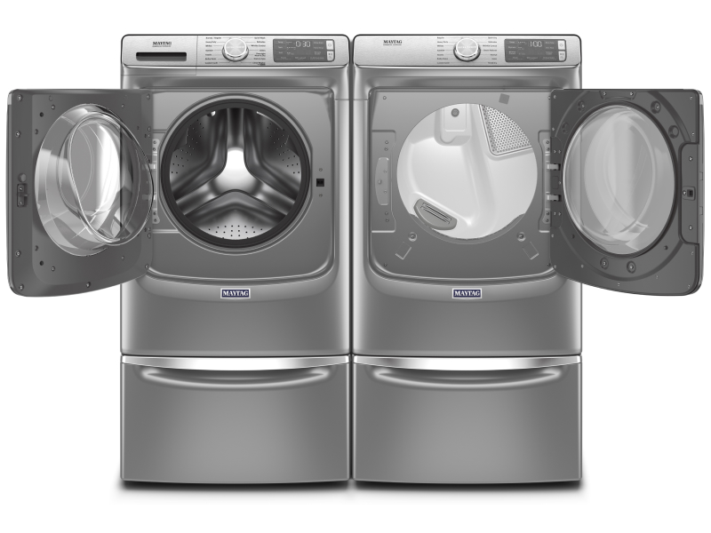 A front view of a Maytag® Front Load Washer and Dryer with the doors open
