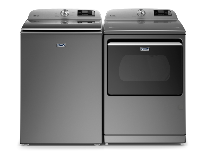 A front view of a gray washer and dryer pair by Maytag brand