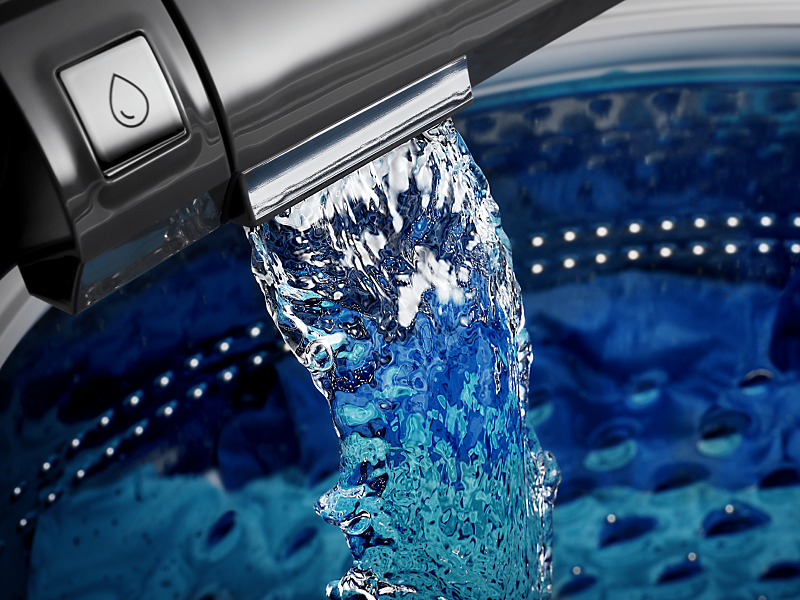 Water pouring into Maytag® washing machine