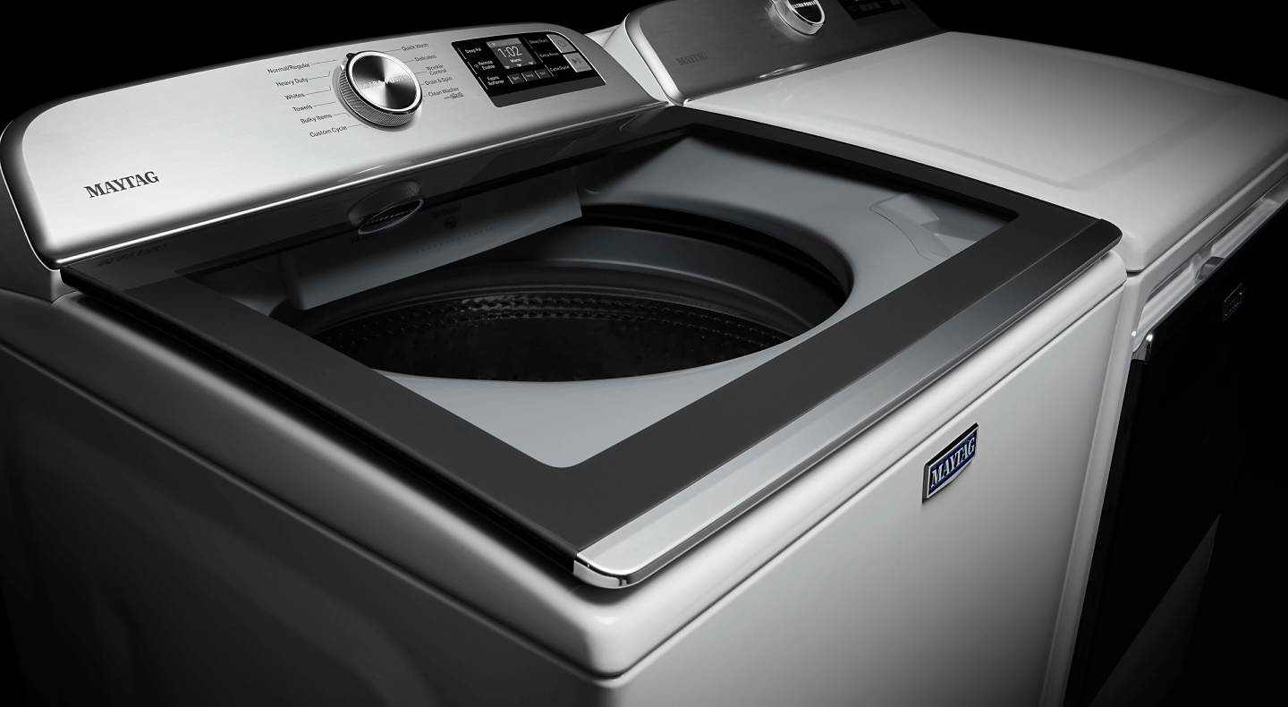 Clean laundry pair with a glass lid washer Clean laundry pair with a glass lid washer