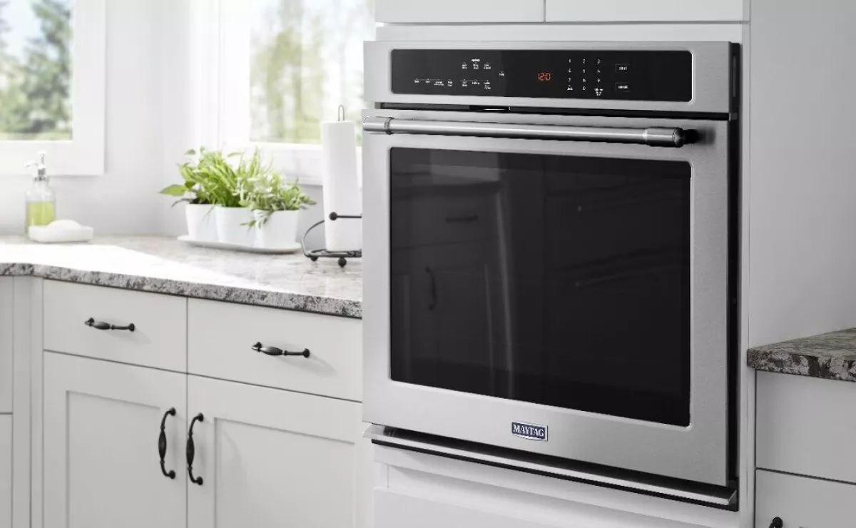https://kitchenaid-h.assetsadobe.com/is/image/content/dam/business-unit/maytag/en-us/marketing-content/site-assets/page-content/oc-articles/how-to-clean-an-oven/how-to-clean-an-oven_Thumbnail.png?wid=1200&fmt=webp
