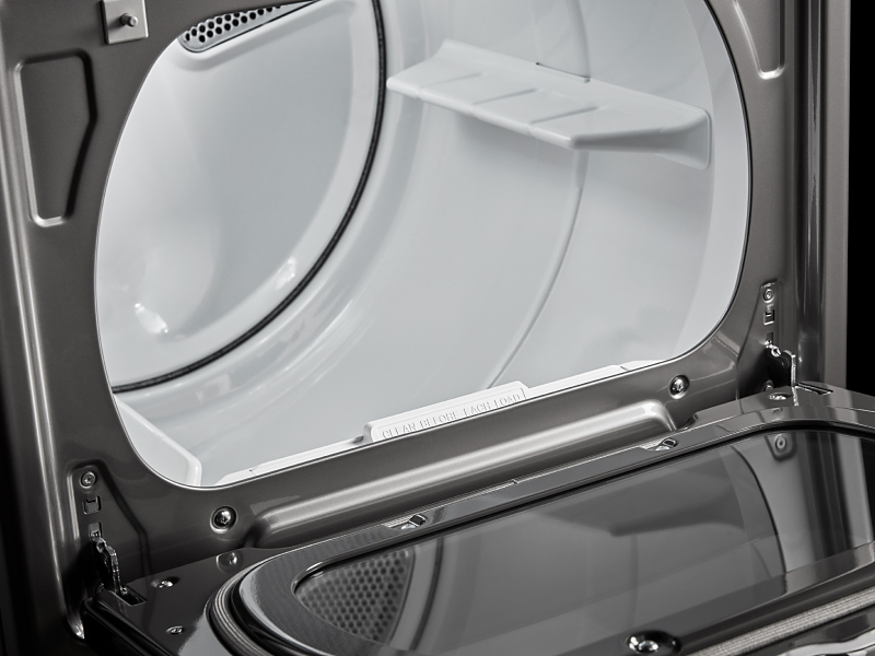 White interior dryer drum of a front load dryer