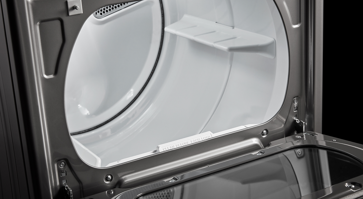 White interior dryer drum of a front load dryer