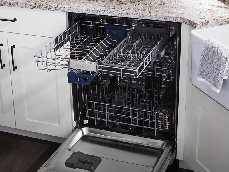 Open, empty dishwasher with the third level rack pulled out