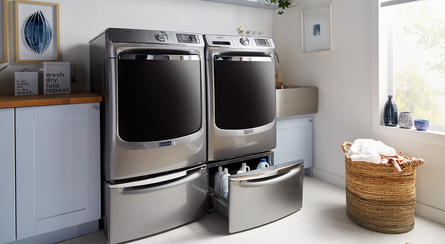 A stainless steel Maytag® washer and dryer set