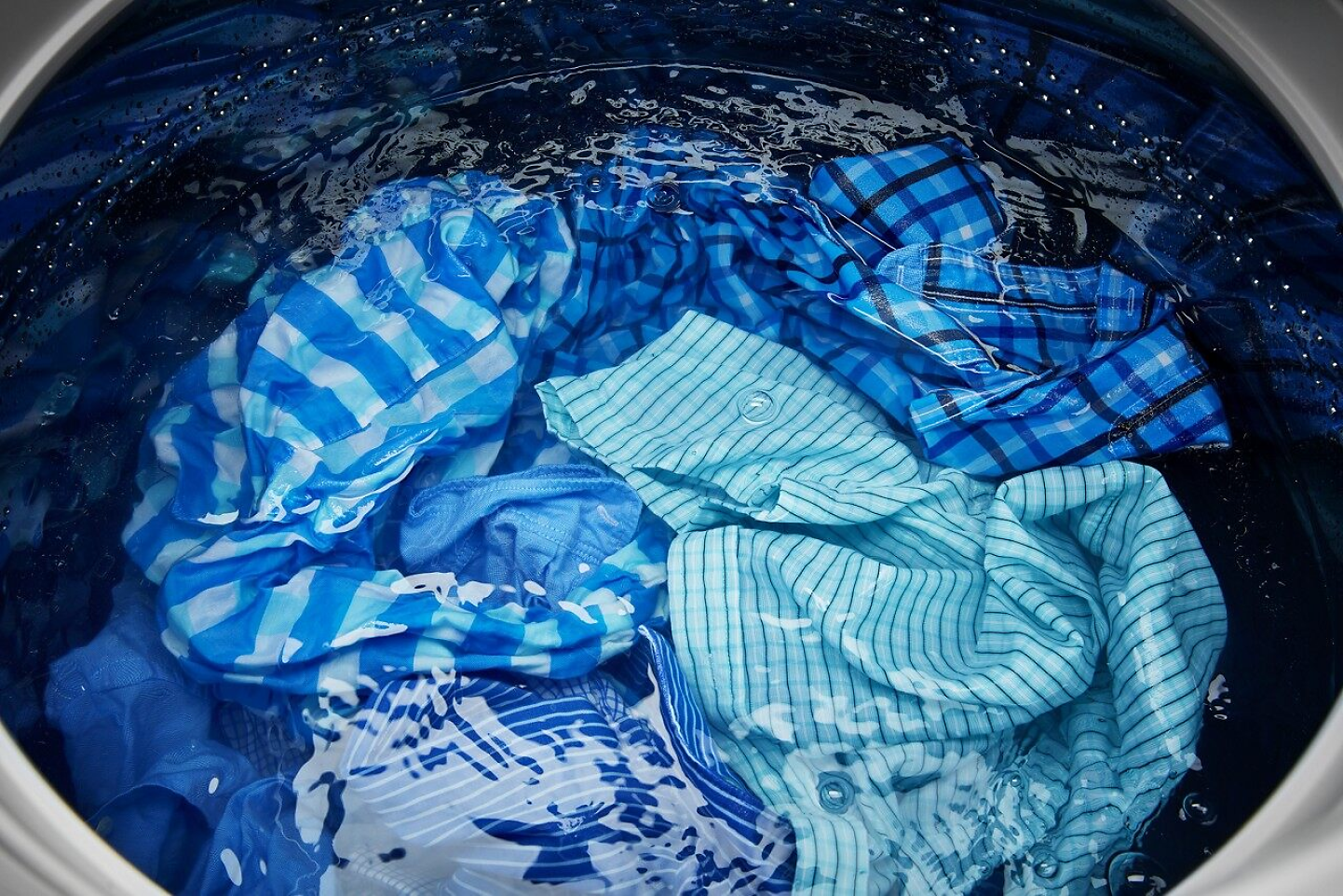 Shirts soaking in the washer