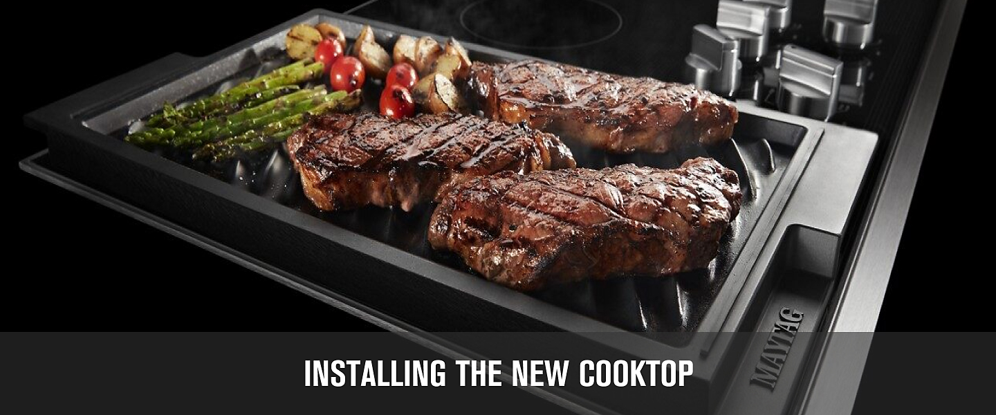 Steaks grilling on a cooktop