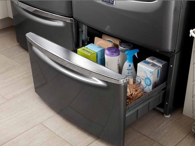 Maytag® washer and dryer on pedestals
