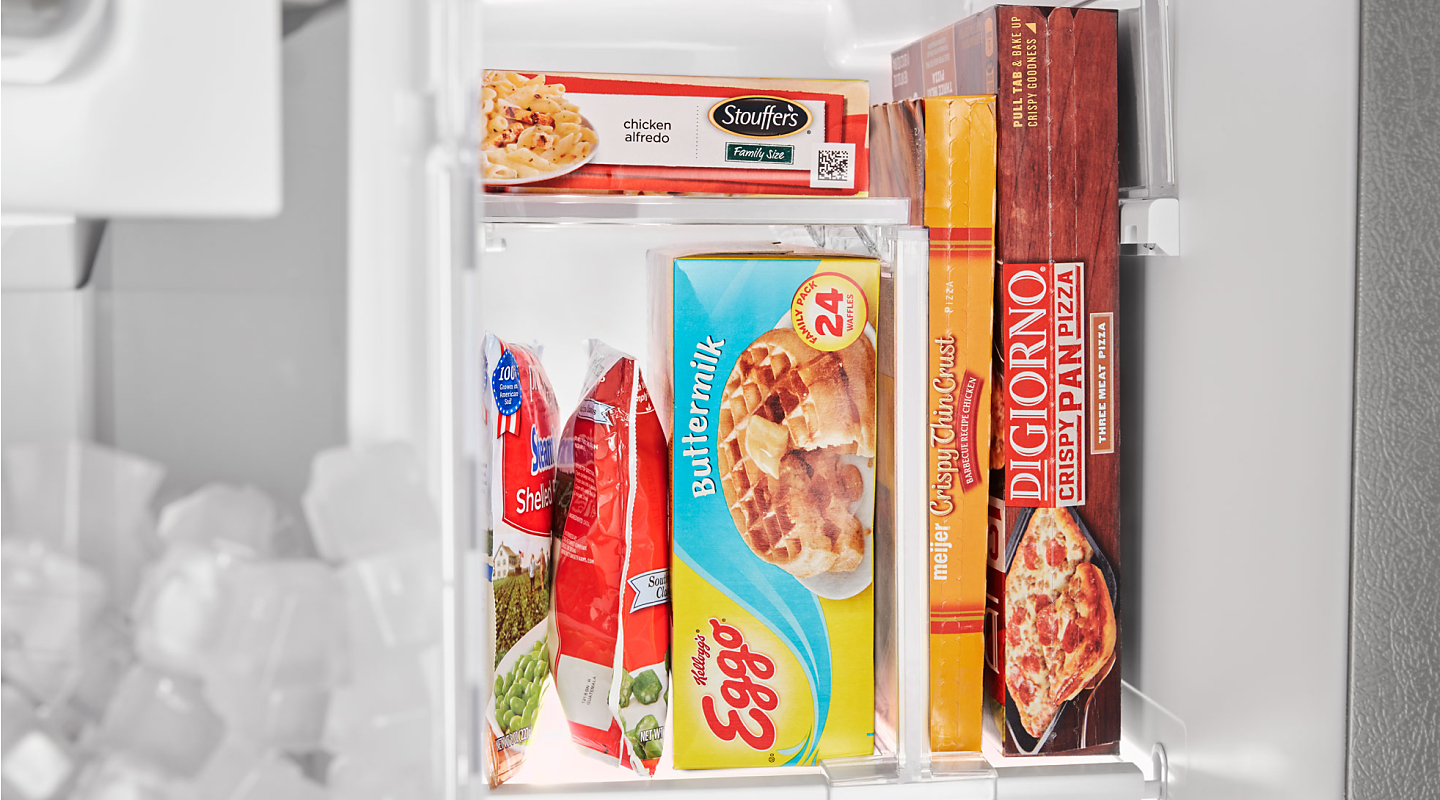 Various frozen meals stored in a fridge