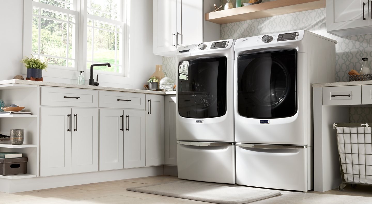 Side by side washer and dryer appliances