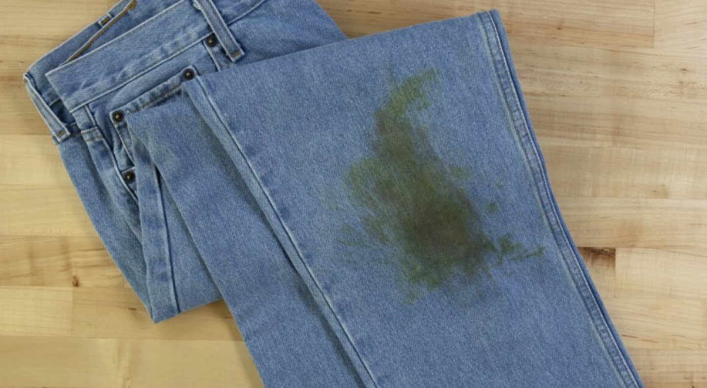 A grass stain on a pair of jeans