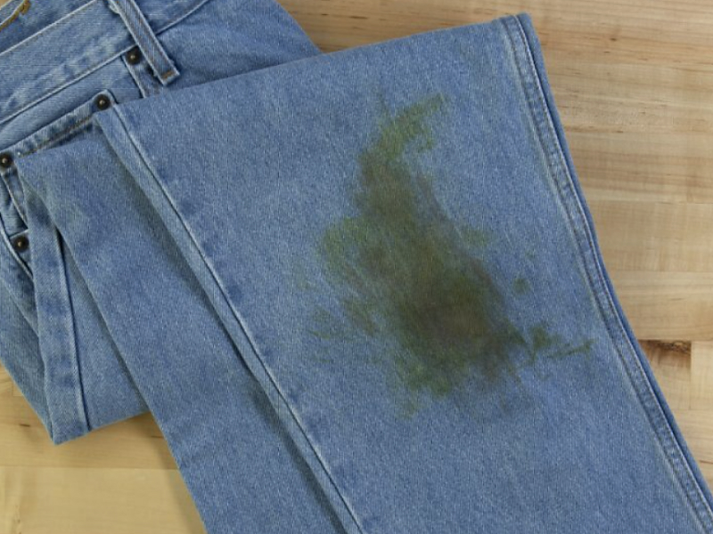 A grass stain on a pair of jeans