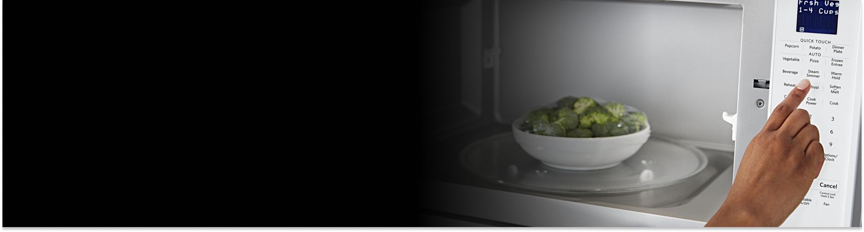 A person programming a Maytag® microwave with a bowl of broccoli