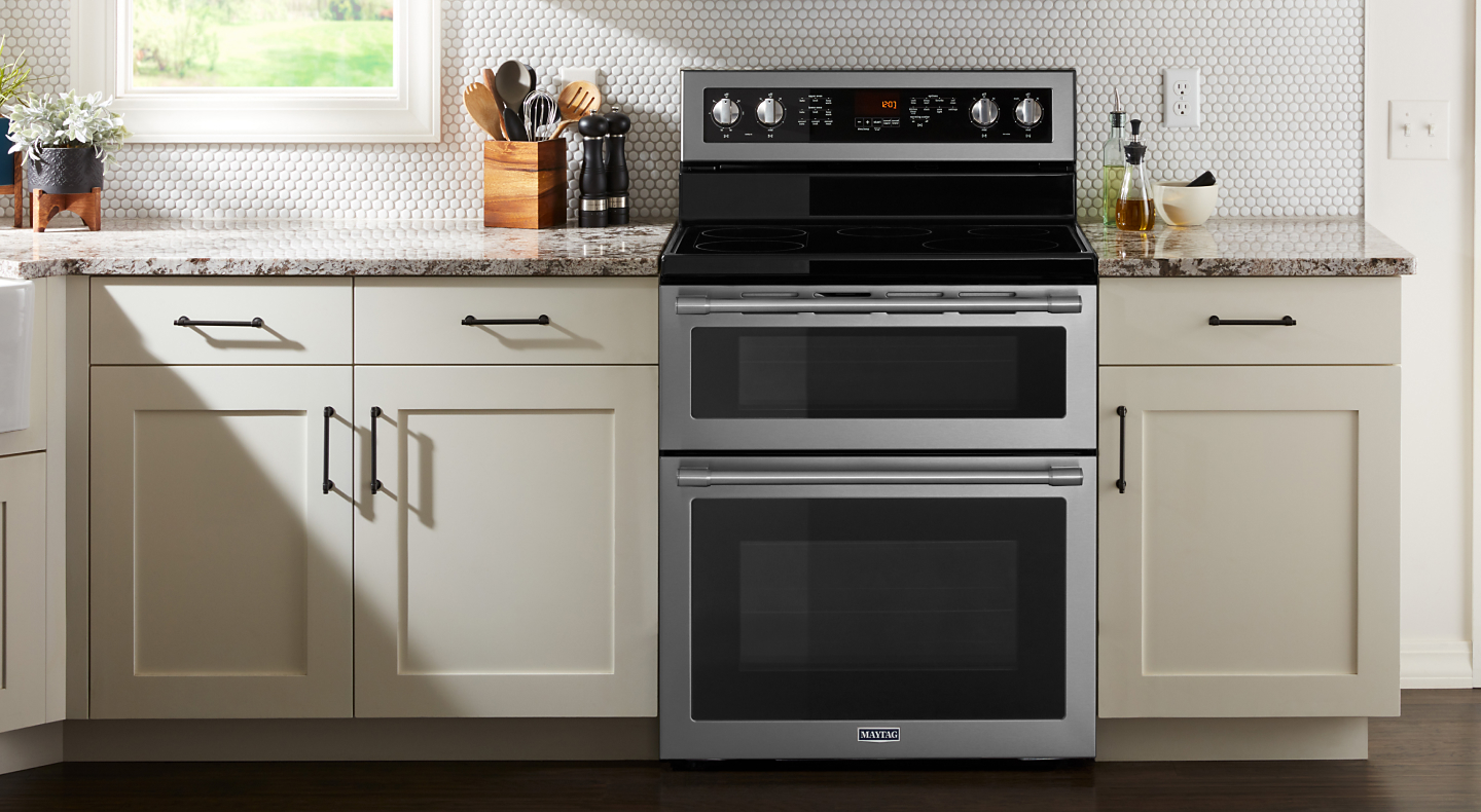 Double oven from Maytag brand in beige cabinetry