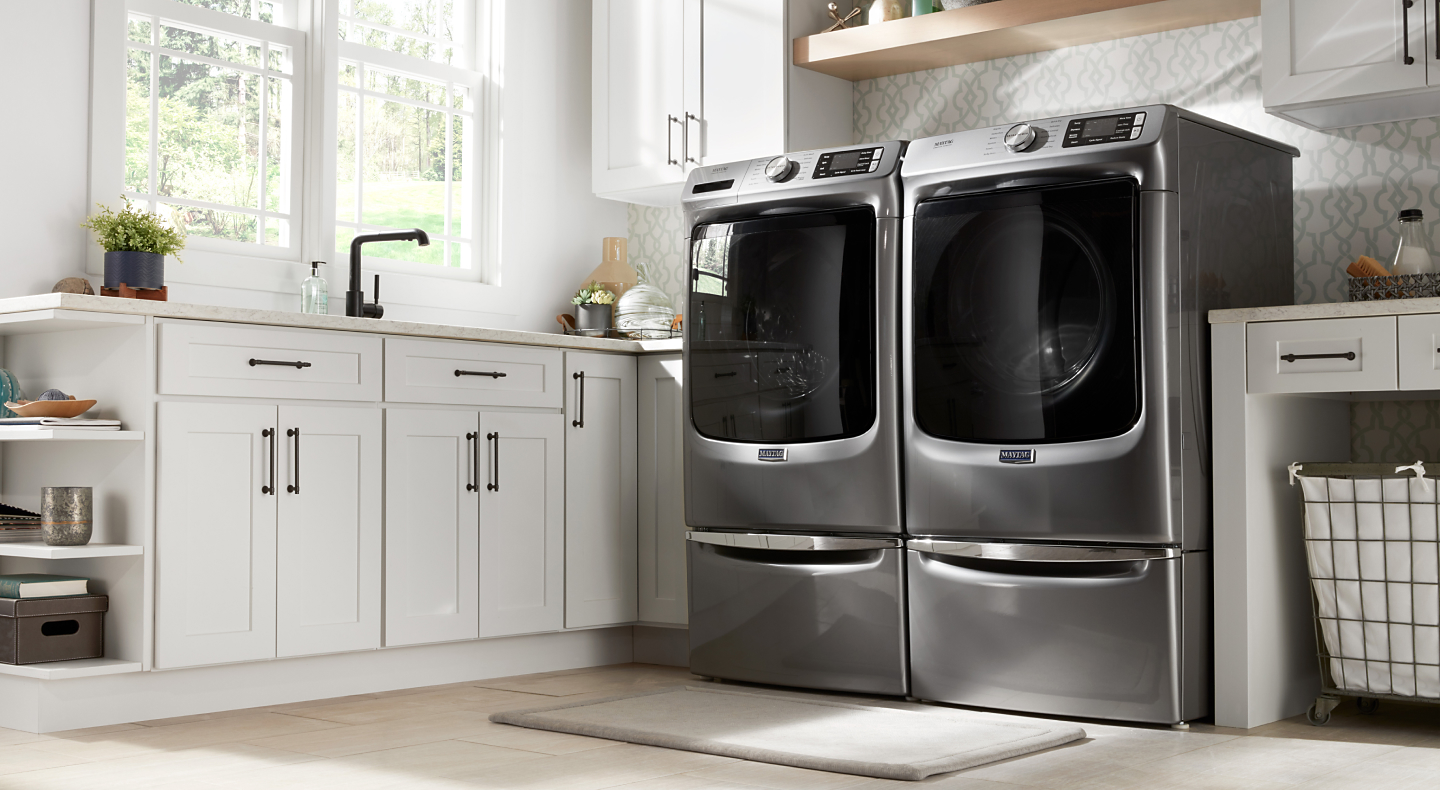 Maytag® washer and dryer set in a laundry room