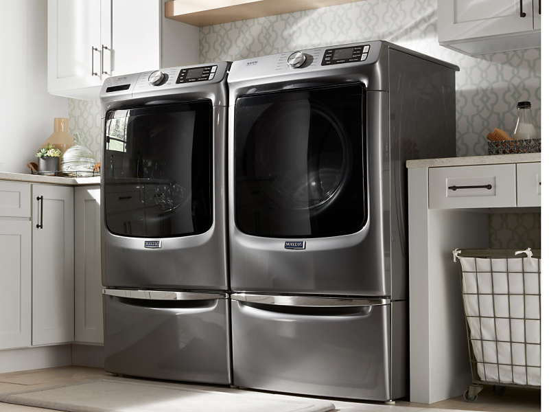 Maytag® washer and dryer set in a laundry room