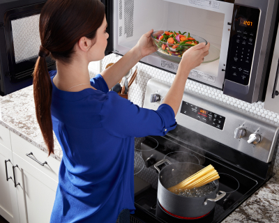 Placing a dish into a microwave
