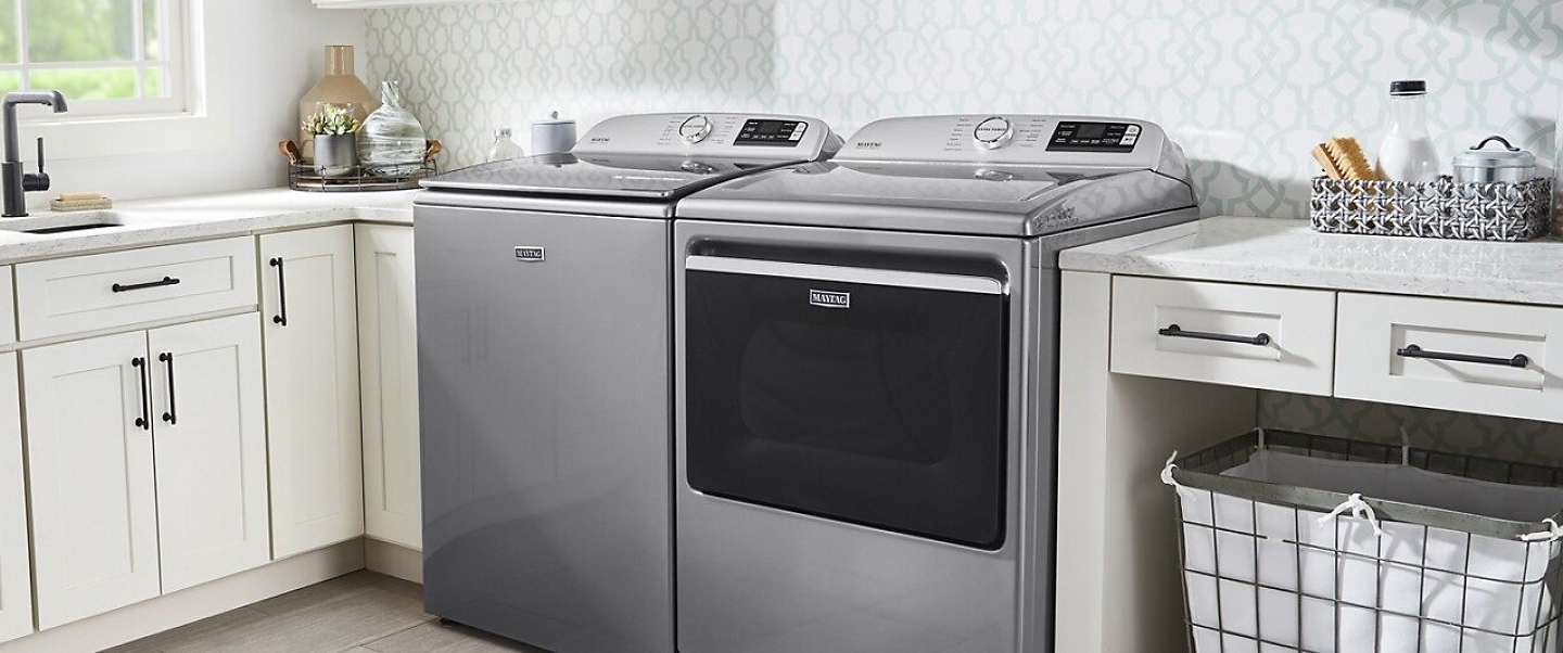 A laundry room with a Maytag® washing machine and dryer.