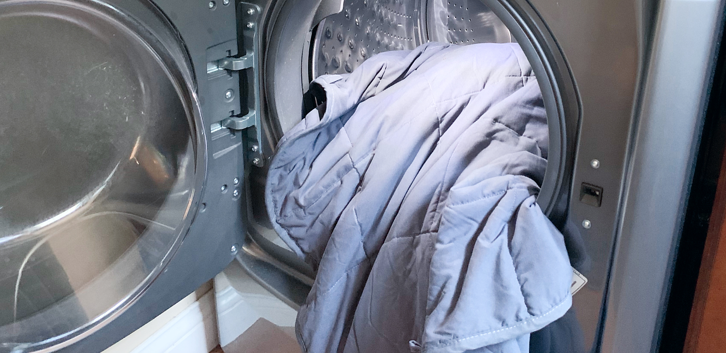 Weighted blanket sitting in washer.