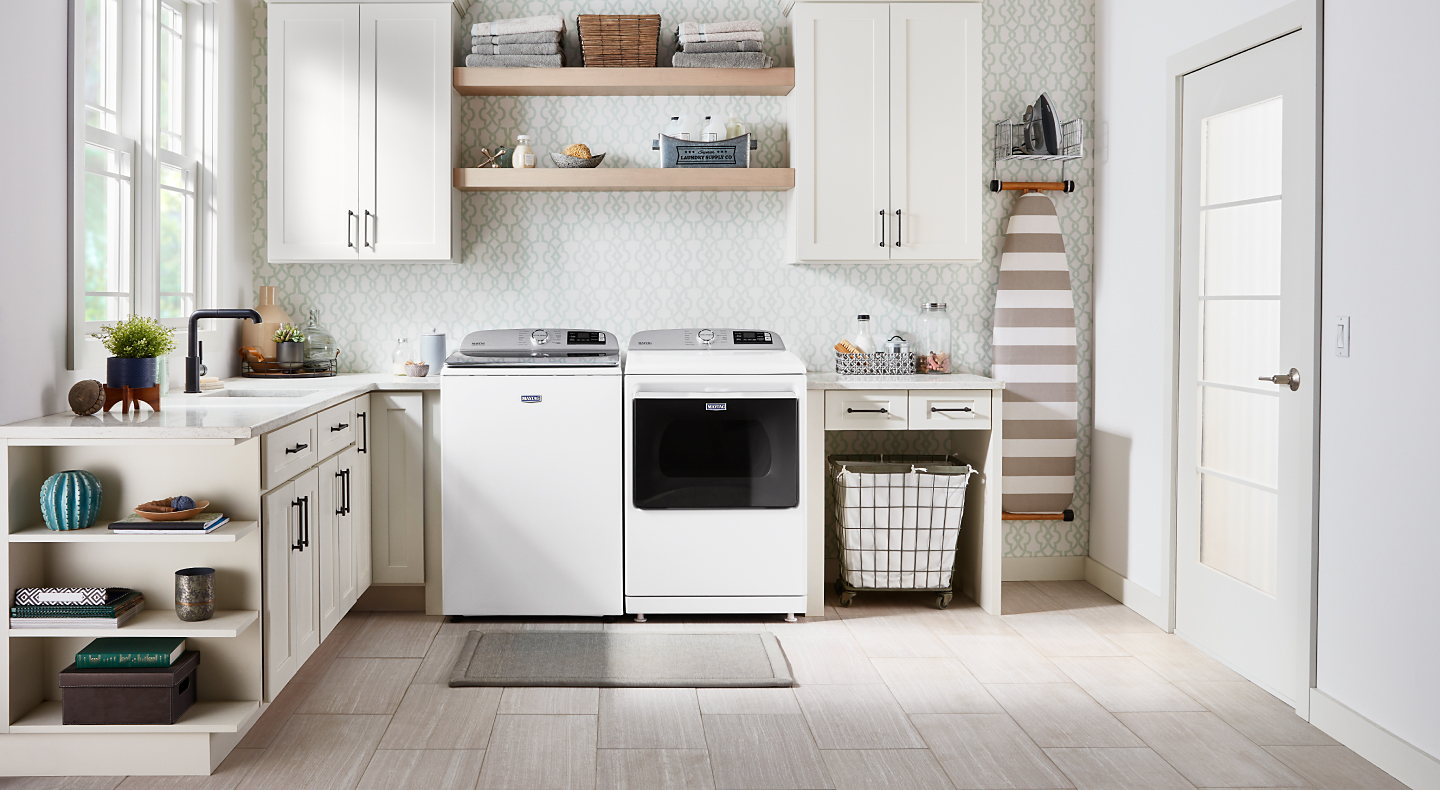 White washer and dryer in laundry room