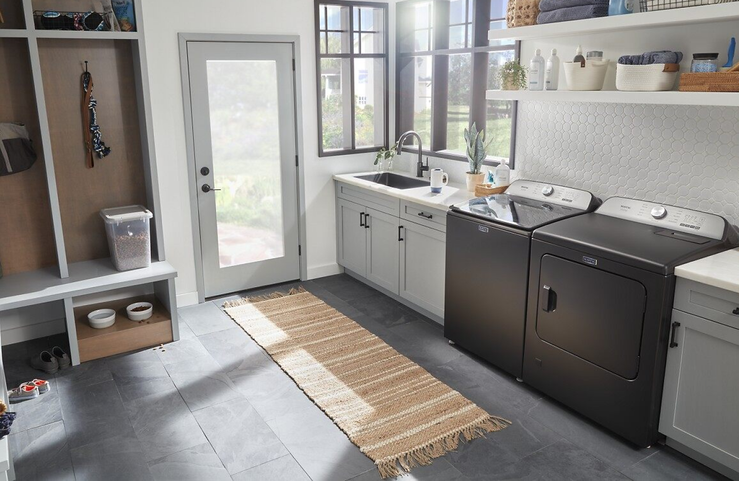 Modern style laundry and mud room with Maytag® washer and dryer