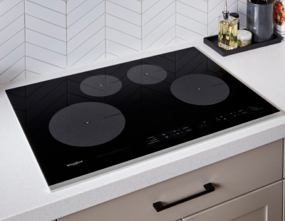  Black induction cooktop on white countertop