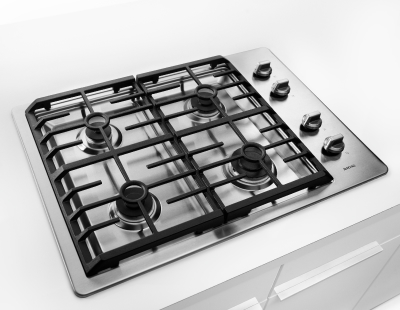 Silver Maytag® gas cooktop with black grates