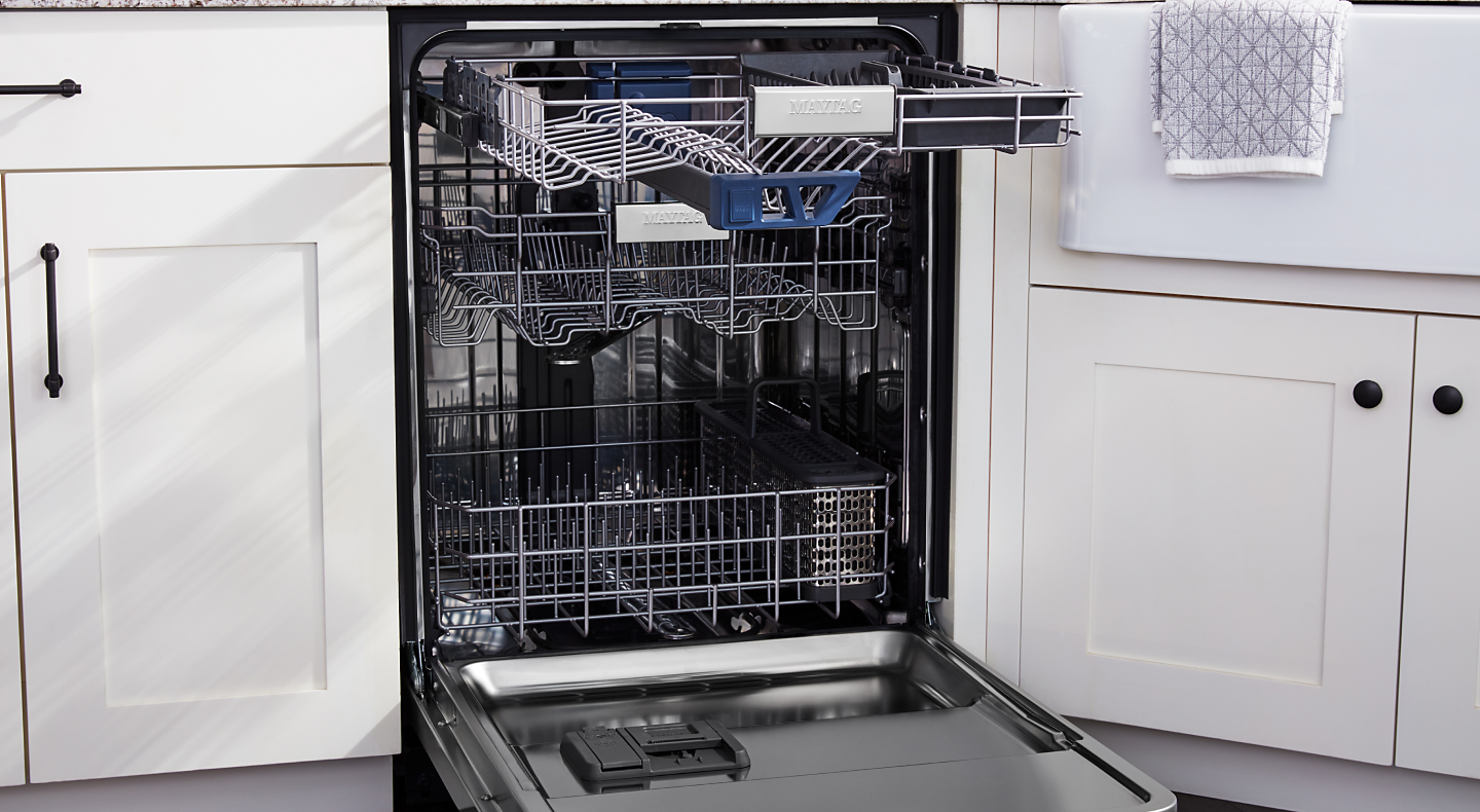 An empty dishwasher with the door open