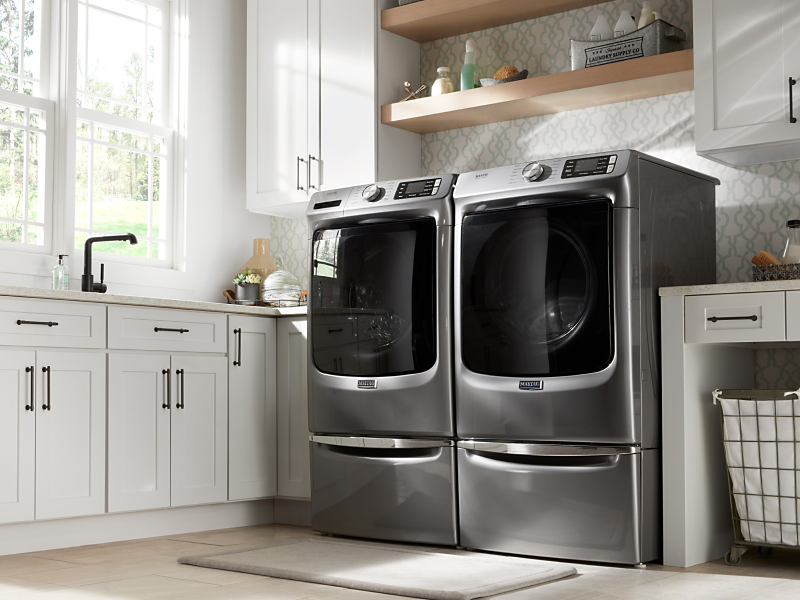 Maytag® washer and dryer in a laundry room