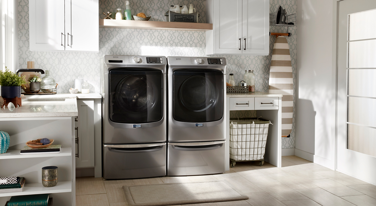 Maytag® washer and dryer in a laundry room