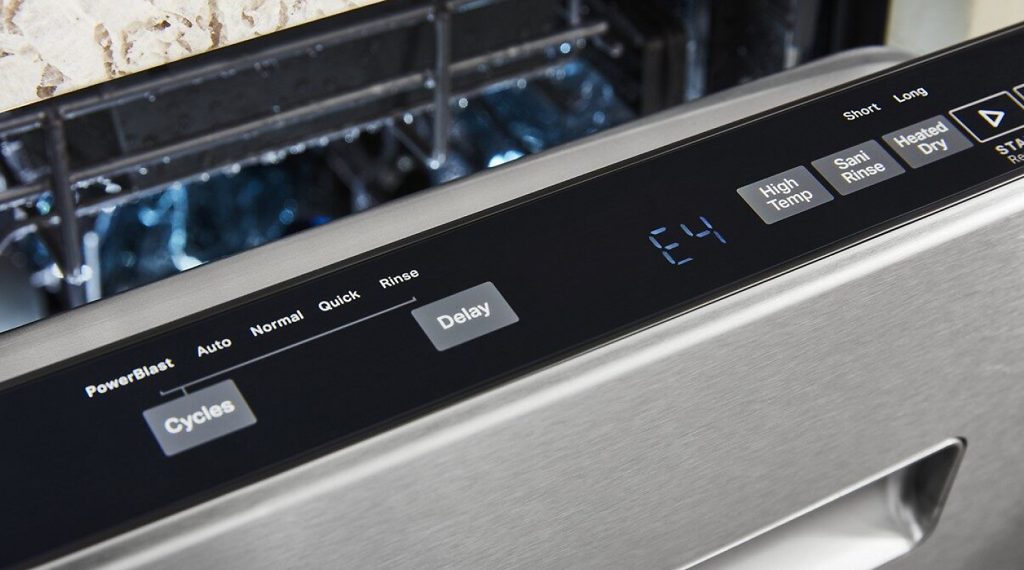 Close up of a top control dishwasher control panel
