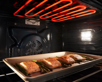 Fish cooking in an oven