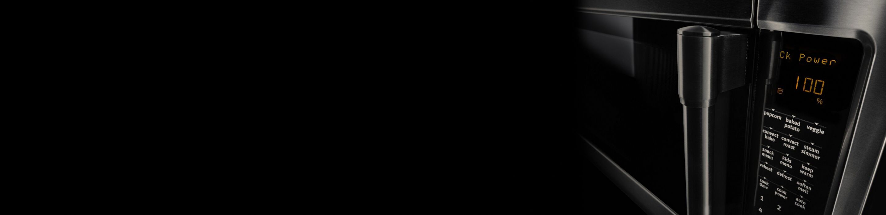 Close-up of microwave in dark background