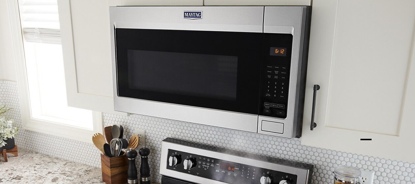Over-the-range microwave in a light kitchen