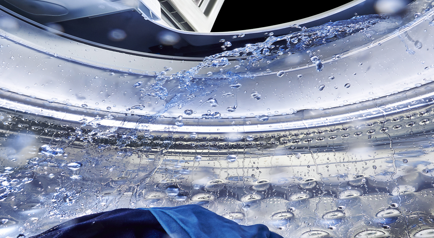 Water splashing in washing machine drum Water splashing in washing machine drum