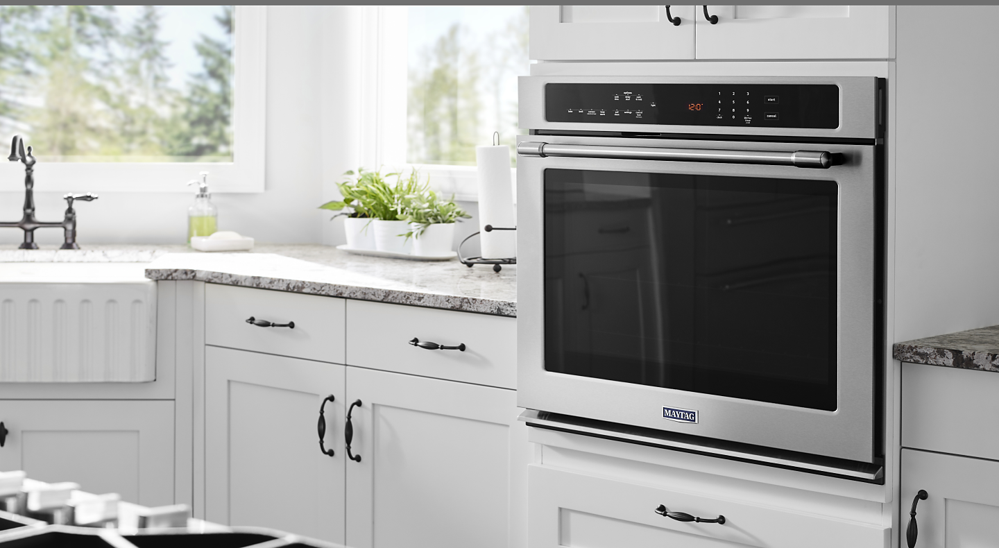 Maytag® wall oven set in cabinetry