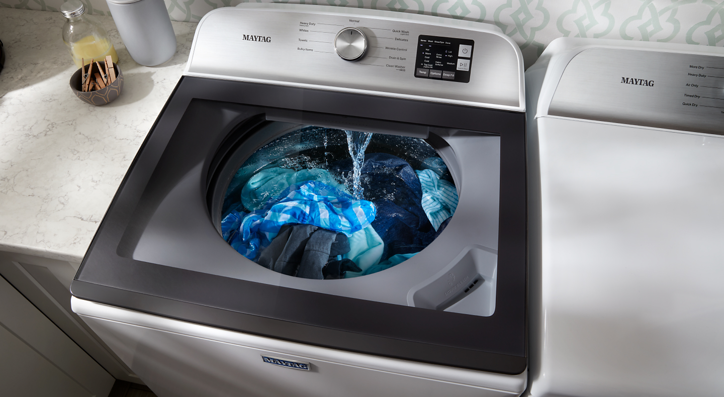 Laundry being cleaned in a Maytag® washing machine set to a normal cycle