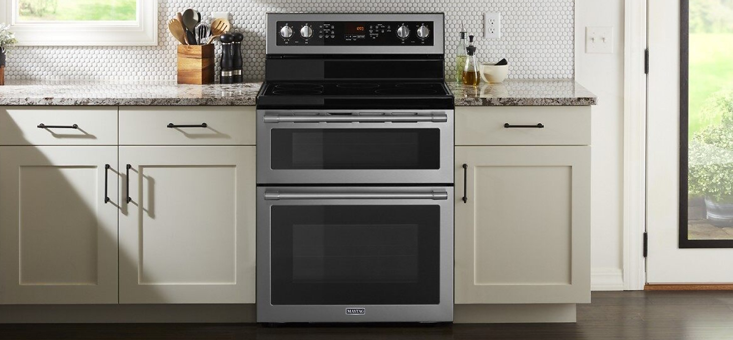 Double electric range in a white kitchen
