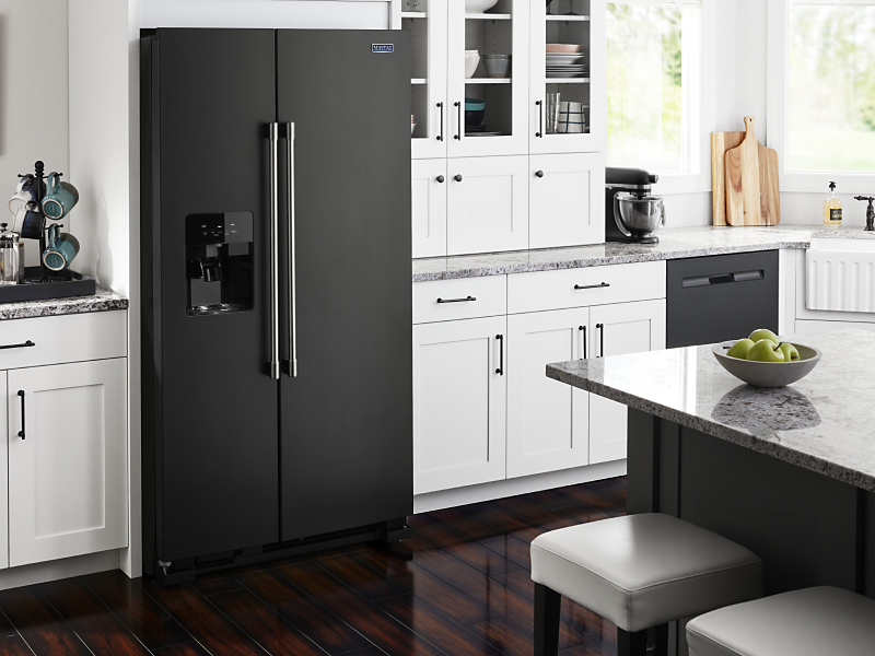 A Maytag® refrigerator in a kitchen space