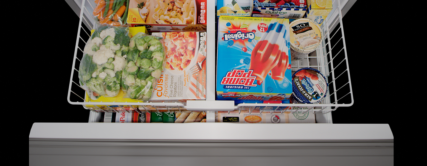 Close up of an open freezer drawer