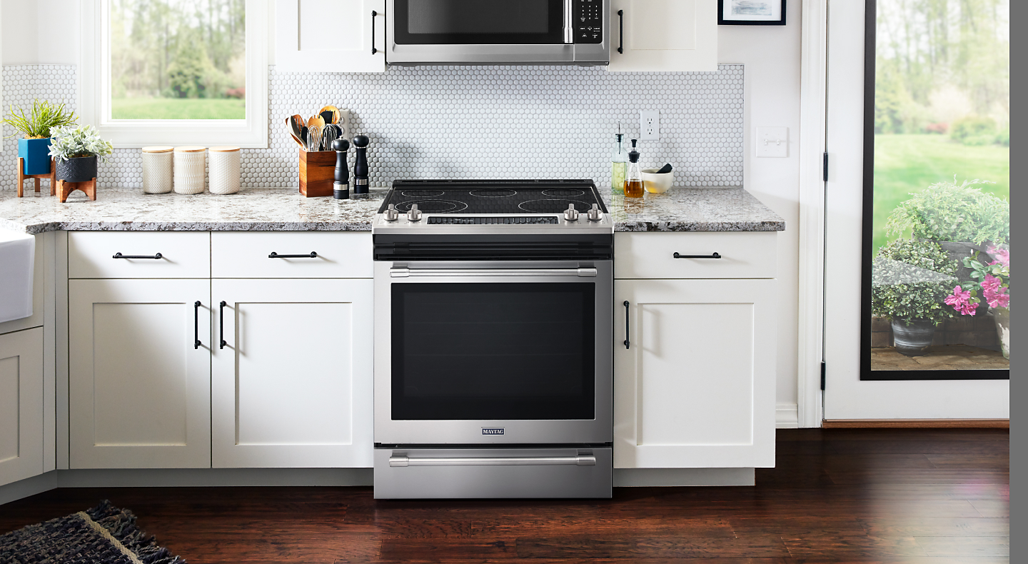 Maytag® range set in cabinetry