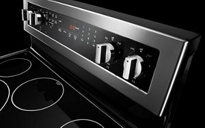 Maytag Mec4536wb 36 Inch Electric Cooktop With 5 Heavy Duty Coil Elements Porcelain Surface No Drip Chrome Bowls And Element In Use Light Black