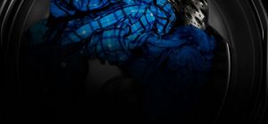 Clothes soaking in a top load washer.