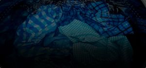 Top load washer with lid open.