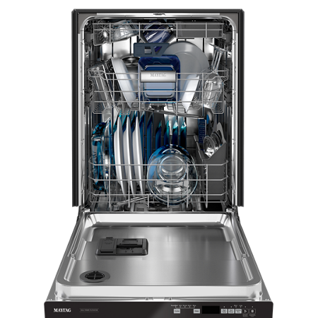 An open Maytag® dishwasher with dishes inside.