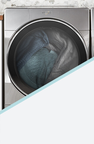 A front load washing machine cleaning clothes.