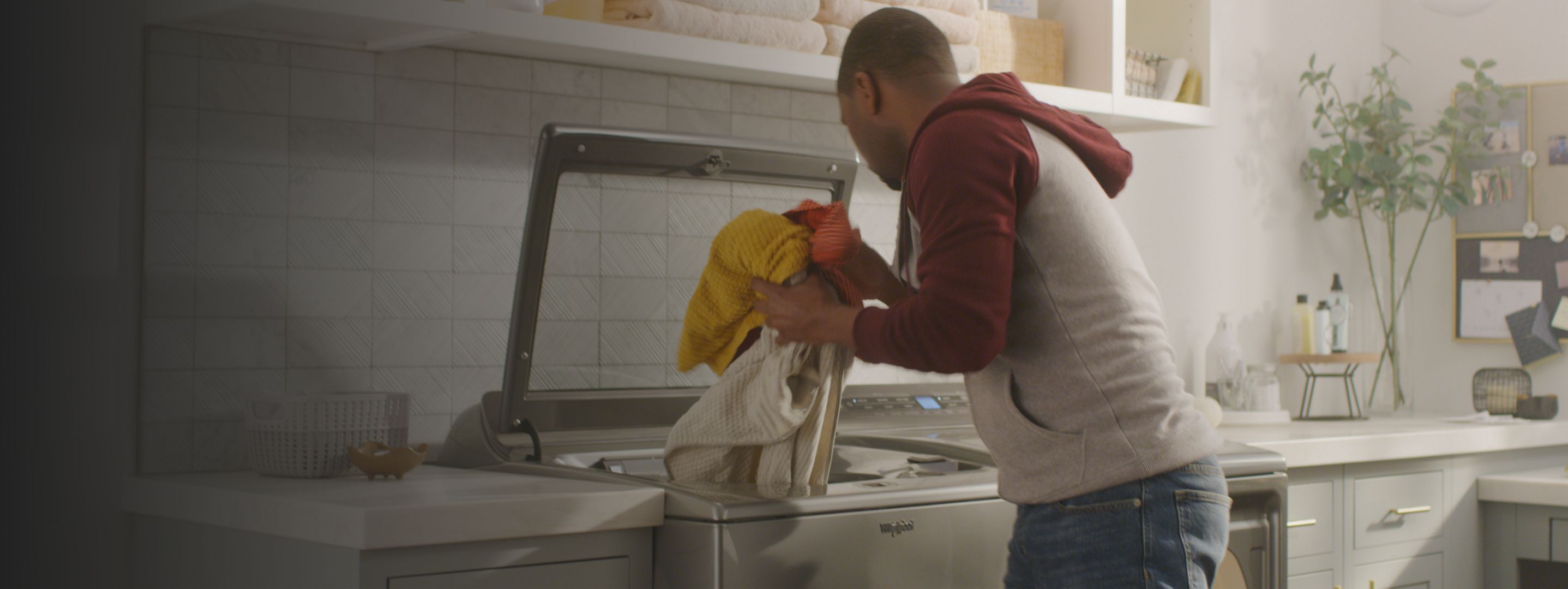 Doing the laundry with a Whirlpool® front load laundry pair.