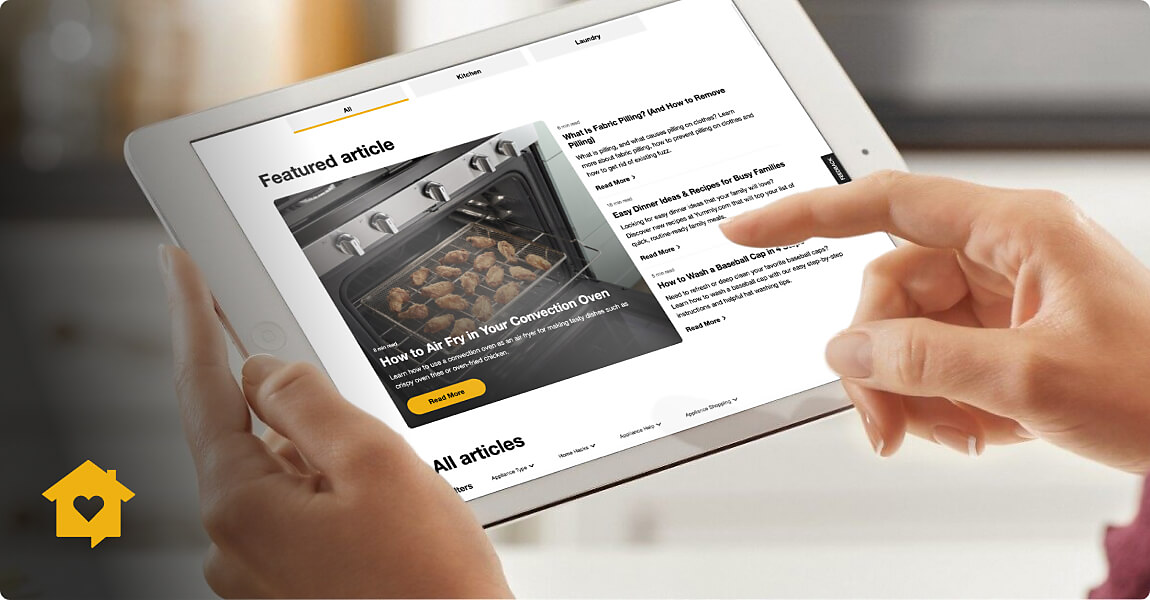 Gold home heartbeat logo over image of a tablet with Whirlpool blog page displayed in the background